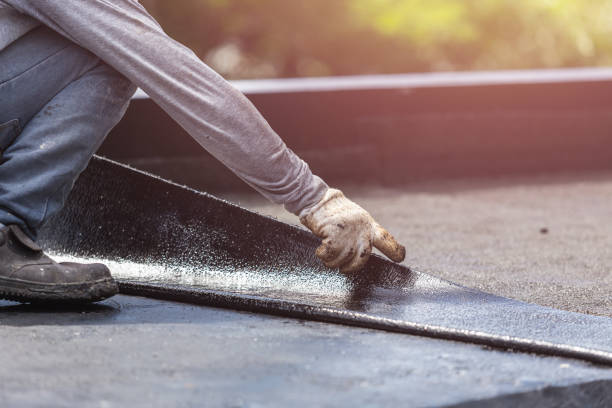 Professional Basement Waterproofing technician working in Belmar, NJ